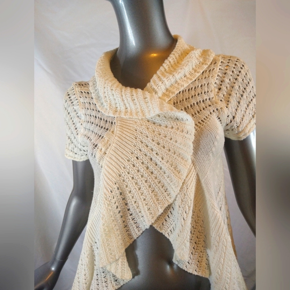 Off white sweater knitted material